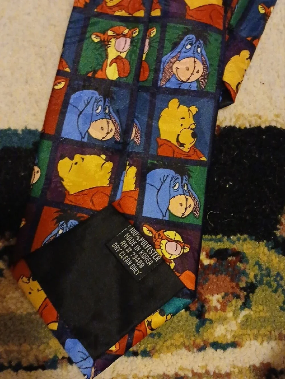 Disney Winnie the Pooh Character Grid Tie in Blue, Yellow, Red, Green